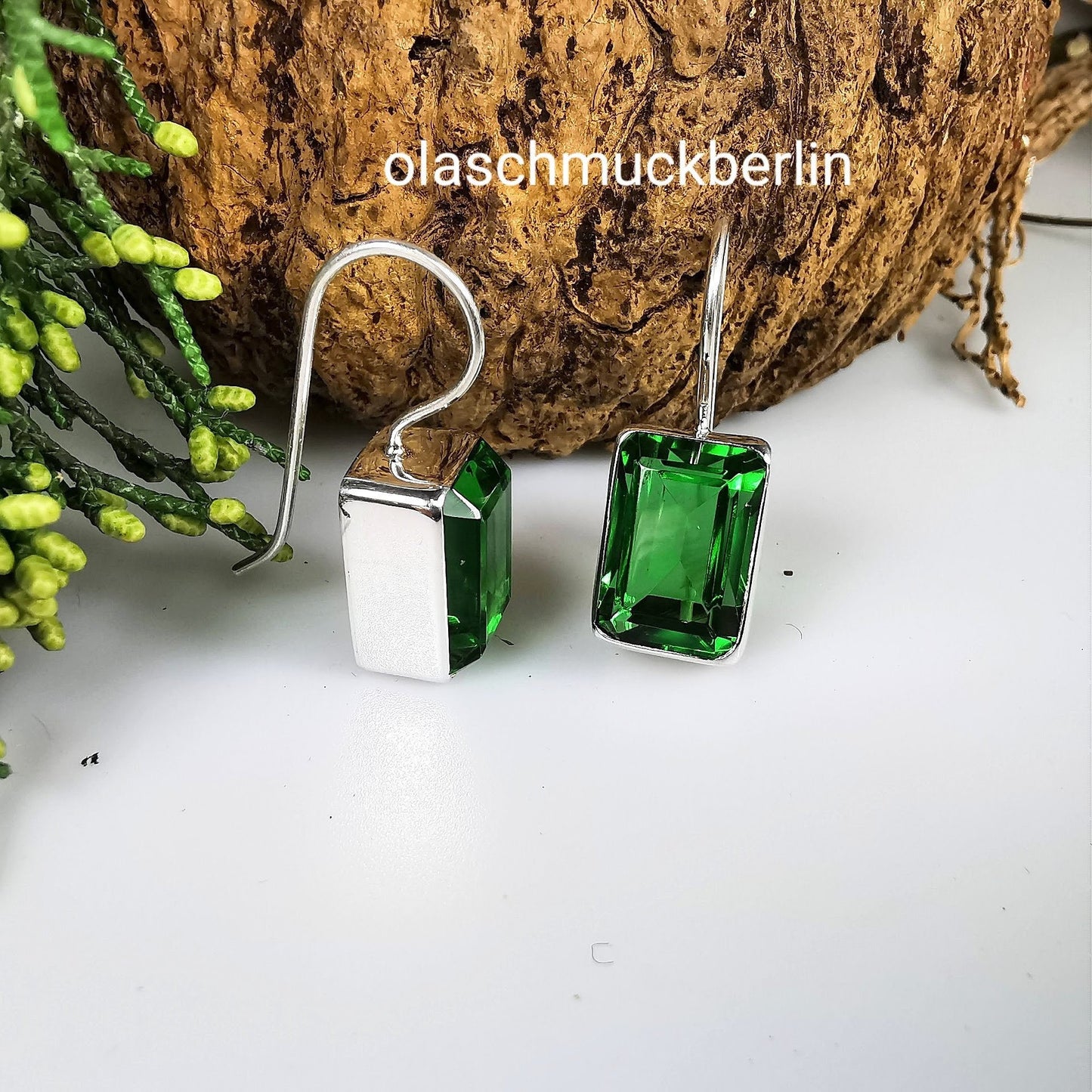 Handgefertigte Silberohrhänger mit Obsidian (Bolivien)