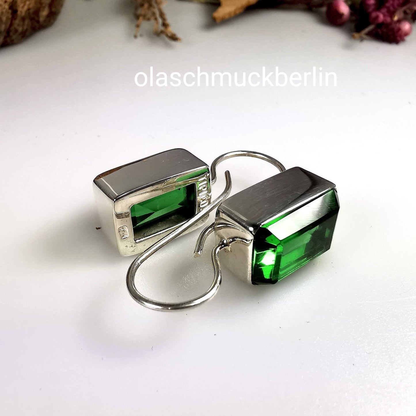 Handgefertigte Silberohrhänger mit Obsidian (Bolivien)