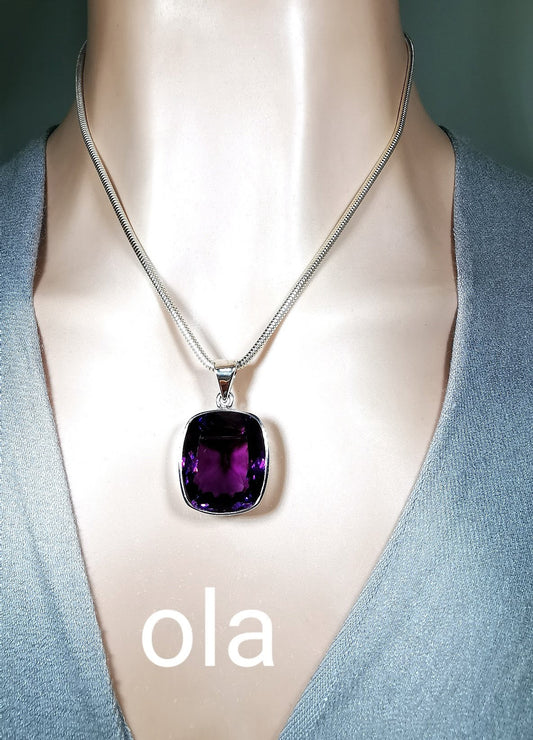 Large amethyst pendant set in silver