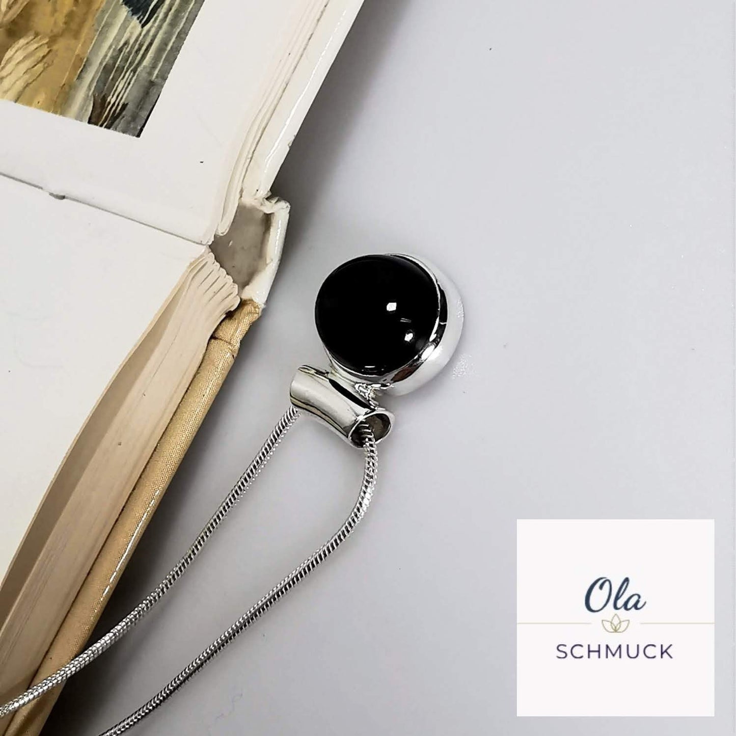 Onixanhänger in Silber gefasst