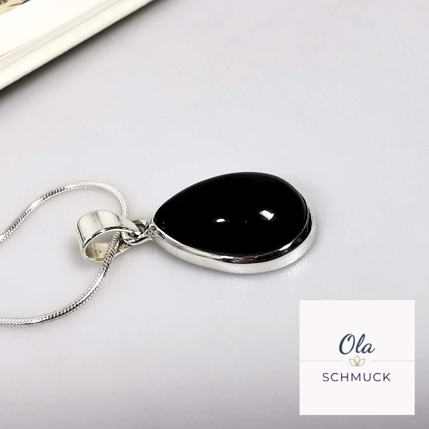 Onix Anhänger Tropfenförmig in Silber gefasst // 1,0