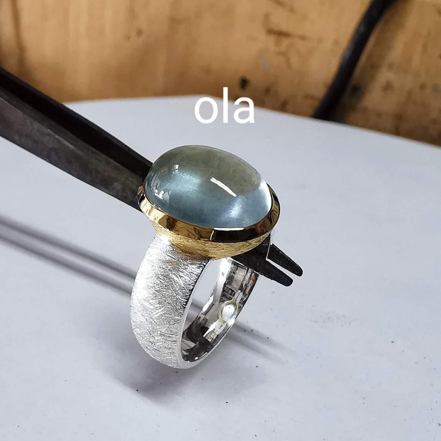 Aquamarin Ring in Silber mit vergoldete Fassung
