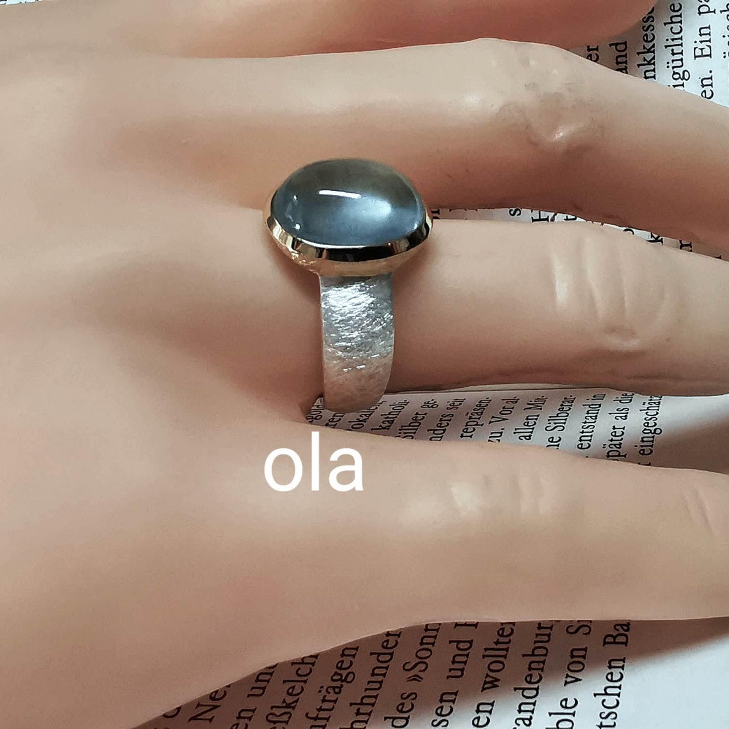 Aquamarin Ring in Silber mit vergoldete Fassung